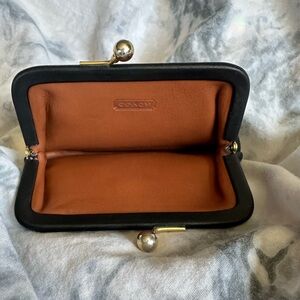 Vintage coach, black and tan kiss lock coin purse